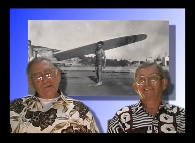 Two elderly men reflect on their past experiences while showcasing vintage archival footage of themselves as young men surfing and engaging in outdoor activities.