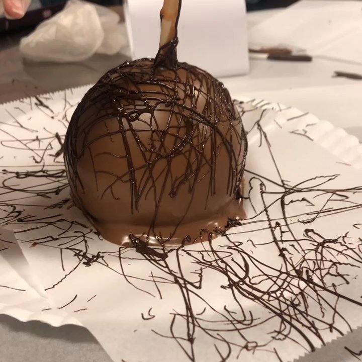 Just Add Chocolate - Drizzling the caramel apple - Chocolatiers & Shops Near Me - Provo, Utah