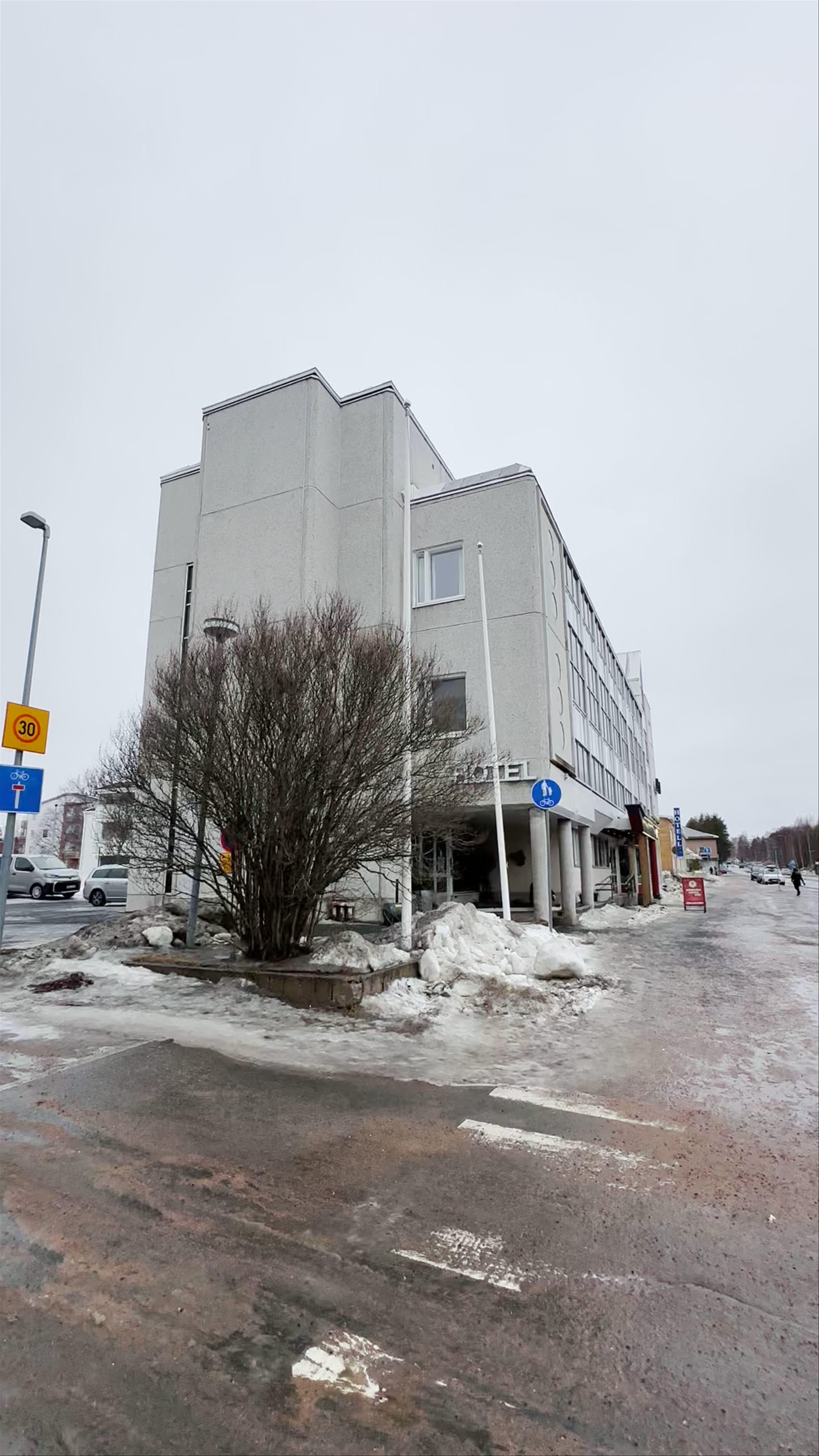 Winter Walk Outside Hotel Rudolf in Rovaniemi, Finland
