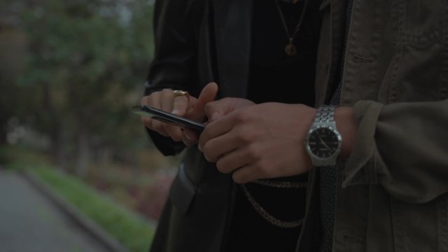 A couple scrolling through a smartphone