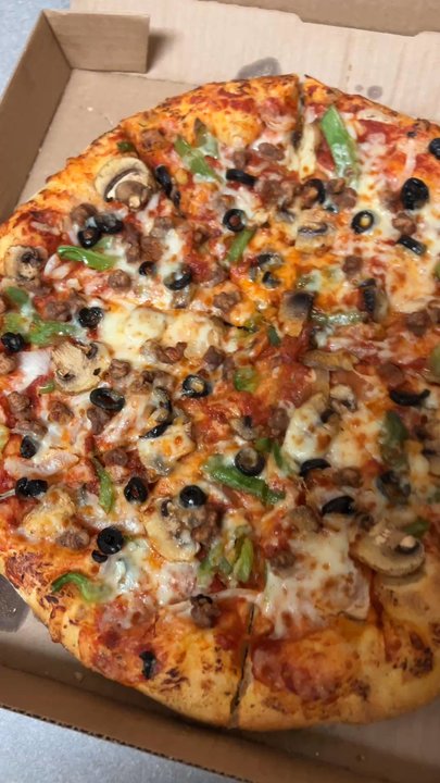 Domino's Pizza - The pizza they gave me was made quickly and without intention. Cheese was missing, toppings were minimal, and the crust was flimsy. - Pizza Near Me - Cheyenne, Wyoming