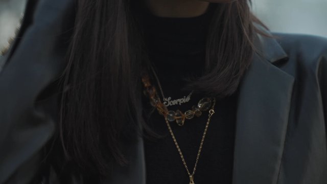 An attractive girl looking at the camera while smiling
