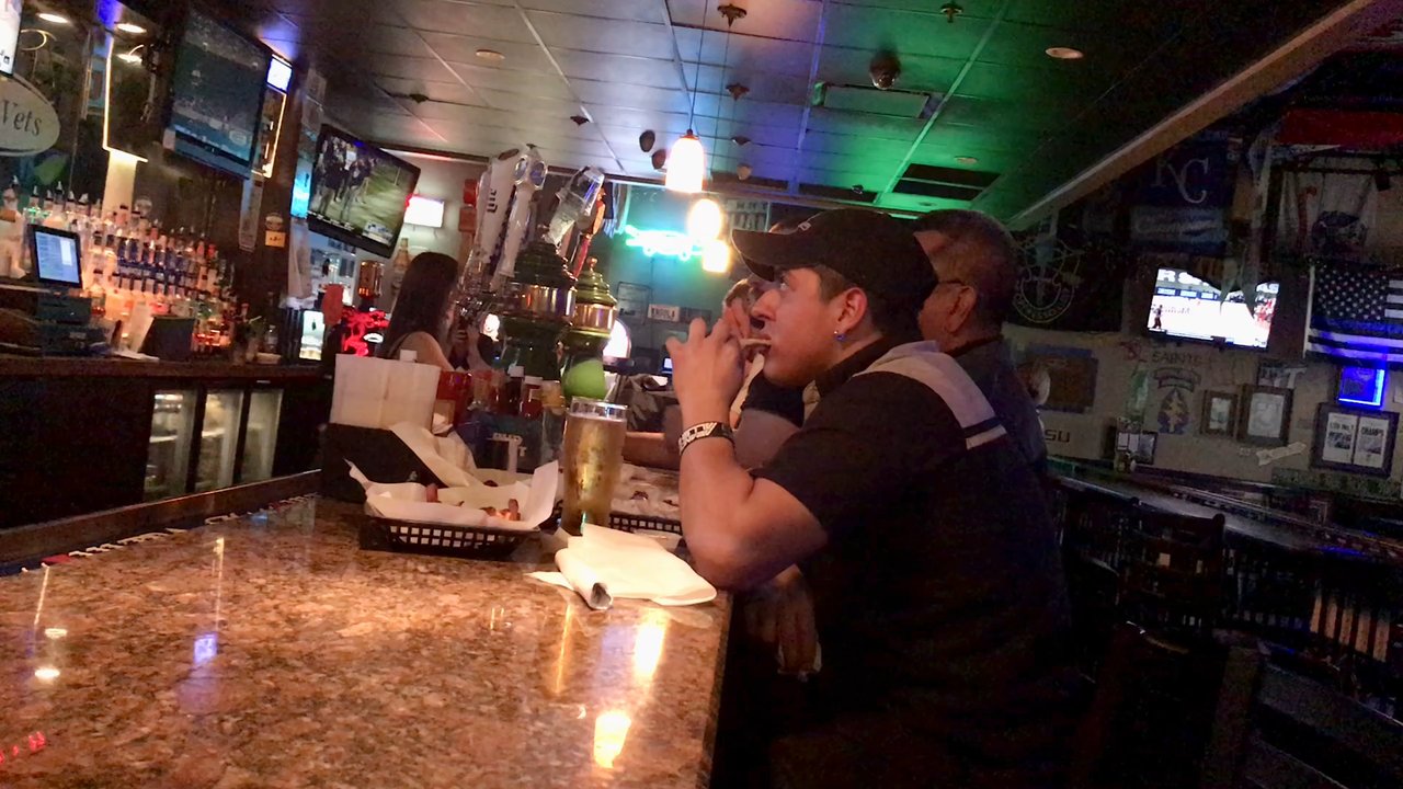 Tavern On Vets - A happy patron at the bar. - Burgers Near Me - Kenner, Louisiana