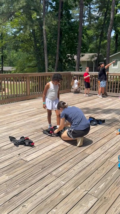 Texas TreeVentures - Putting on the gear - Challenge Courses Near Me - The Woodlands, Texas