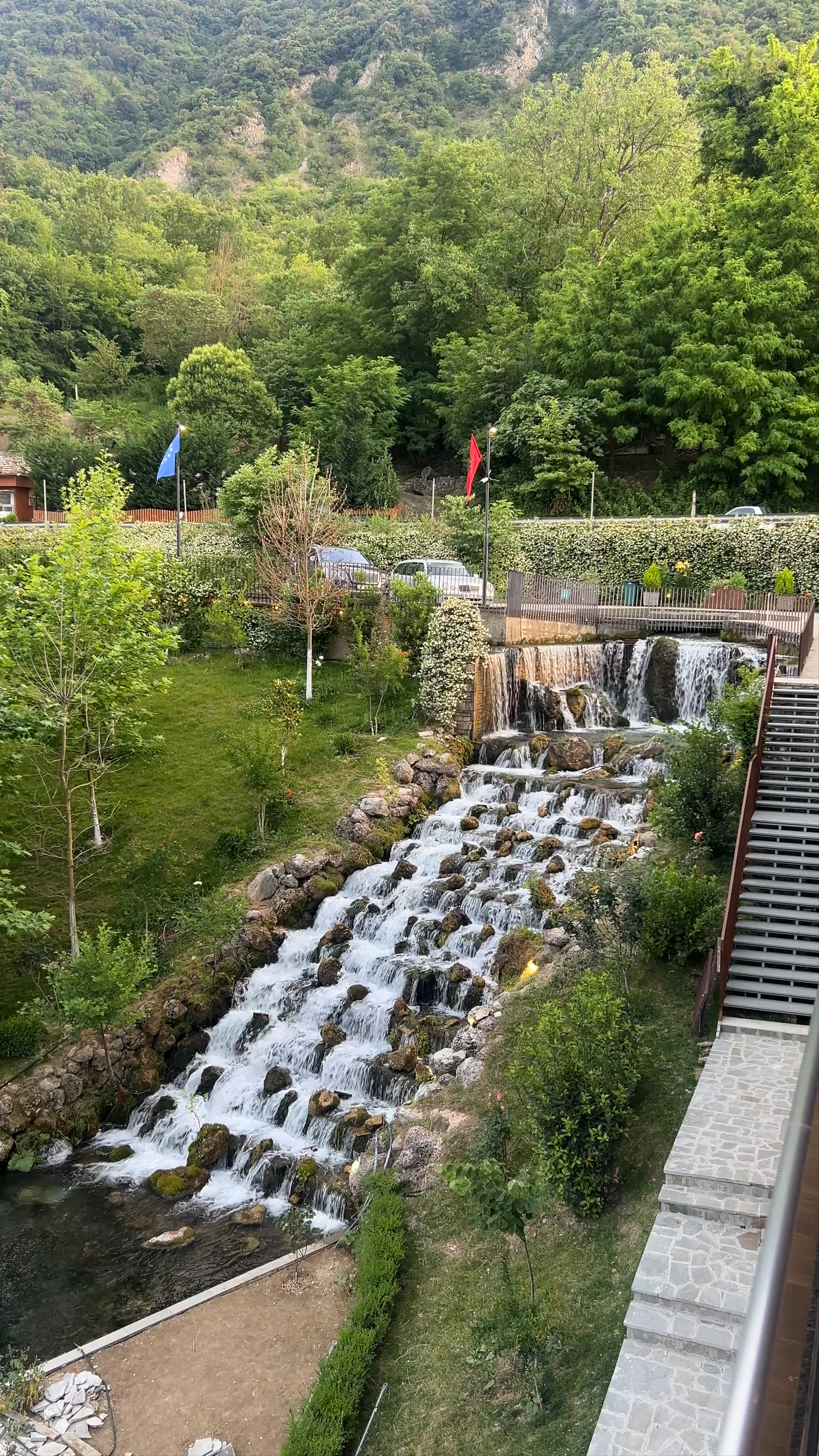 Serene Cascading Waterfall at Hotel Uji Ftohte Tepelene, Albania