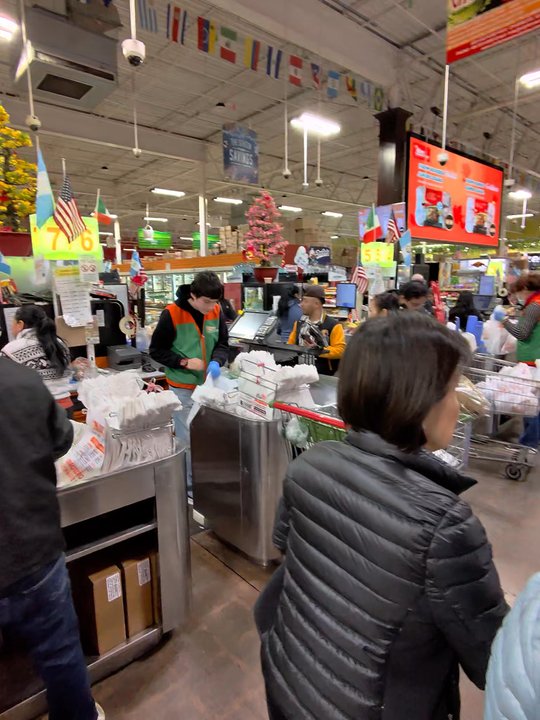 City Farmers Market - Chamblee - Inside. Post-checkout area. Decorated for Chinese New Year. Busy on a Sunday afternoon. - Farmers Market Near Me - Chamblee, Georgia