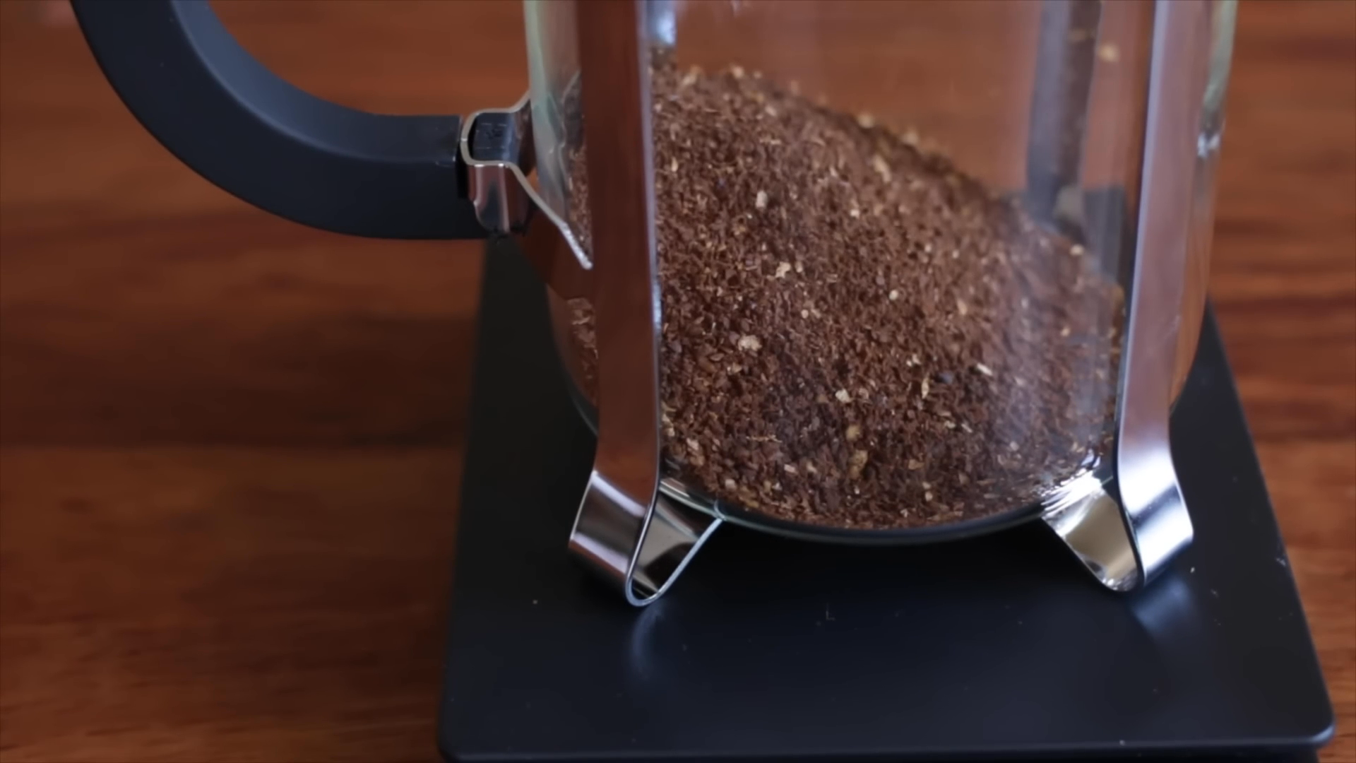 ground coffee beans in a French press