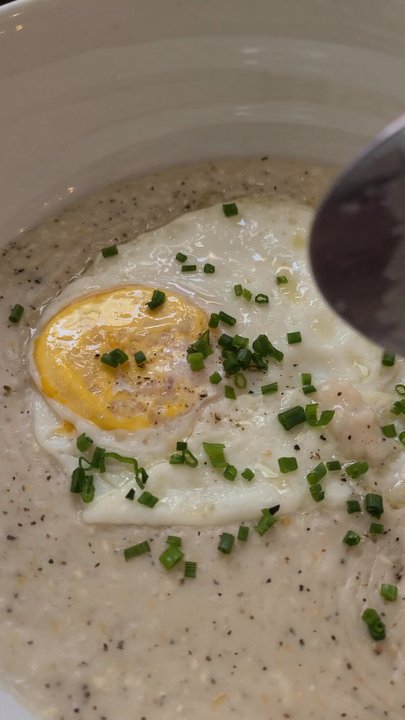 Gracious Plenty Bakery & Breakfast - Grits with an egg over medium - Bakeries Near Me - Roswell, Georgia