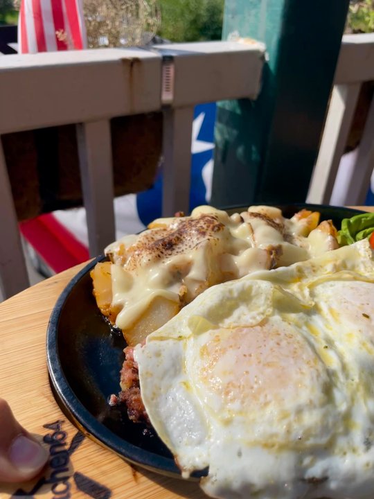 Kitchen 64 - Special - Hash on hot skillet served with home fries, cheese, 2 eggs, avocado, & toast. - Breakfast & Brunch Near Me - Middlebury, Connecticut