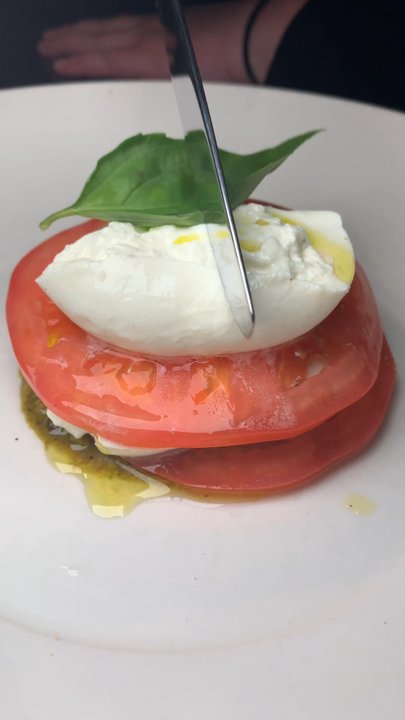 City Cellar - Burrata stack on top of pistachio pesto - Wine Bars Near Me - Westbury, New York