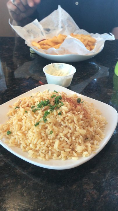 Kabob Inn - Side of rice and fries. Look at the steam! - Middle Eastern Near Me - Dearborn Heights, Michigan