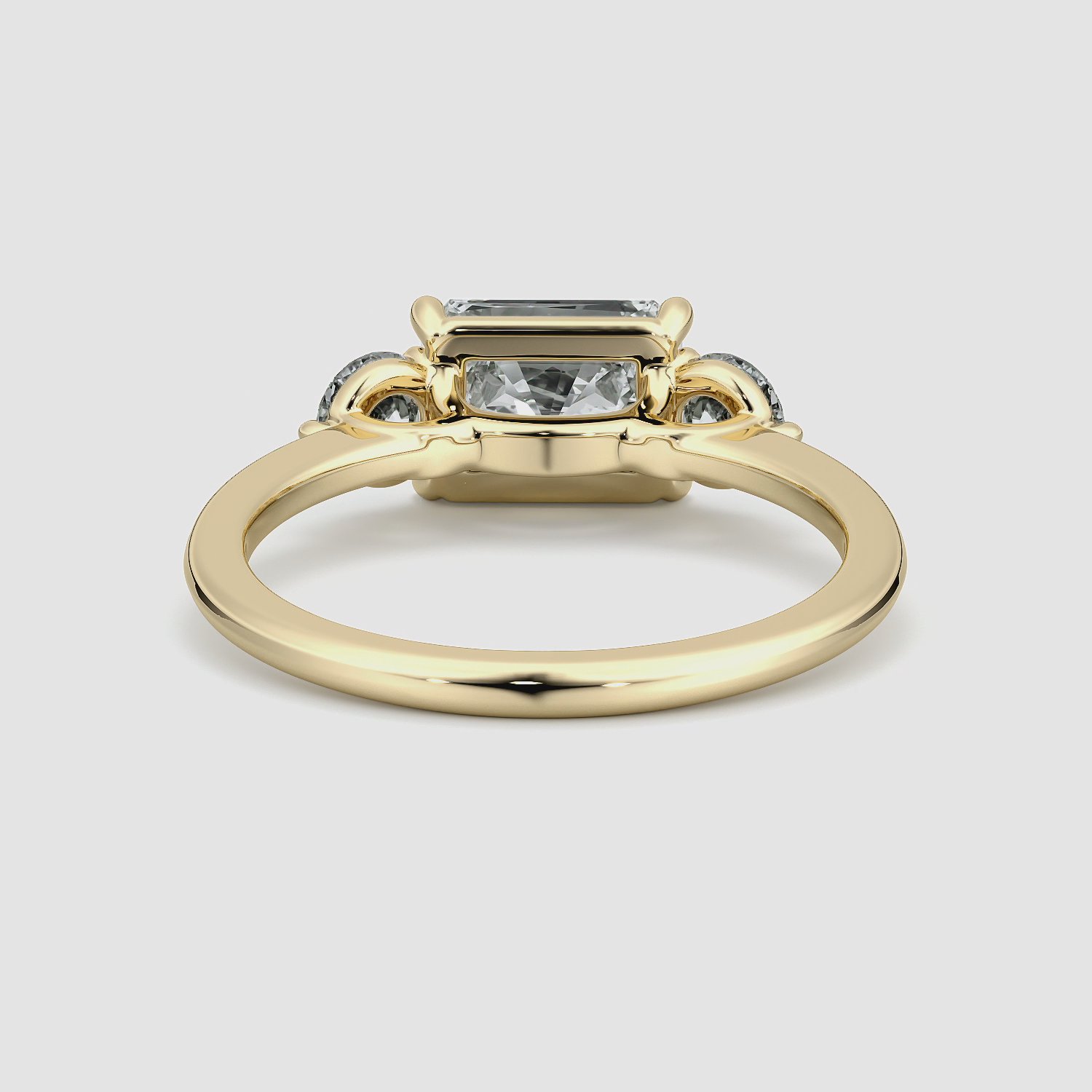 The Three Stone | Radiant | 18k | Yellow Gold | bandAccent: Plain | diamondOrientation: horizontal | sideStoneCarat: 0.25ct | sideStoneShape: Round Brilliant | caratWeight: other
