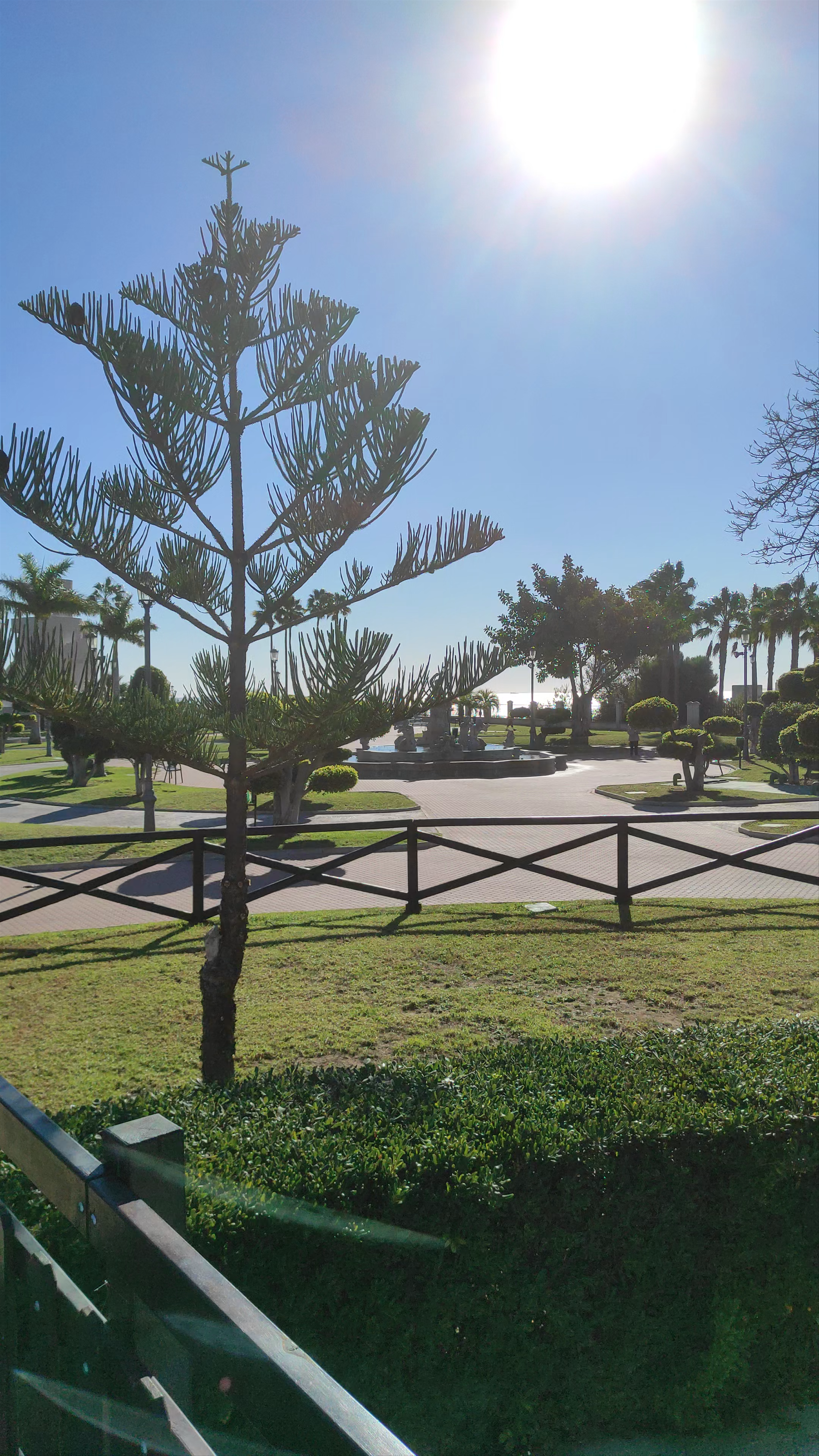 Sunlit Stroll Through Parque de la Batería in Torremolinos, Spain