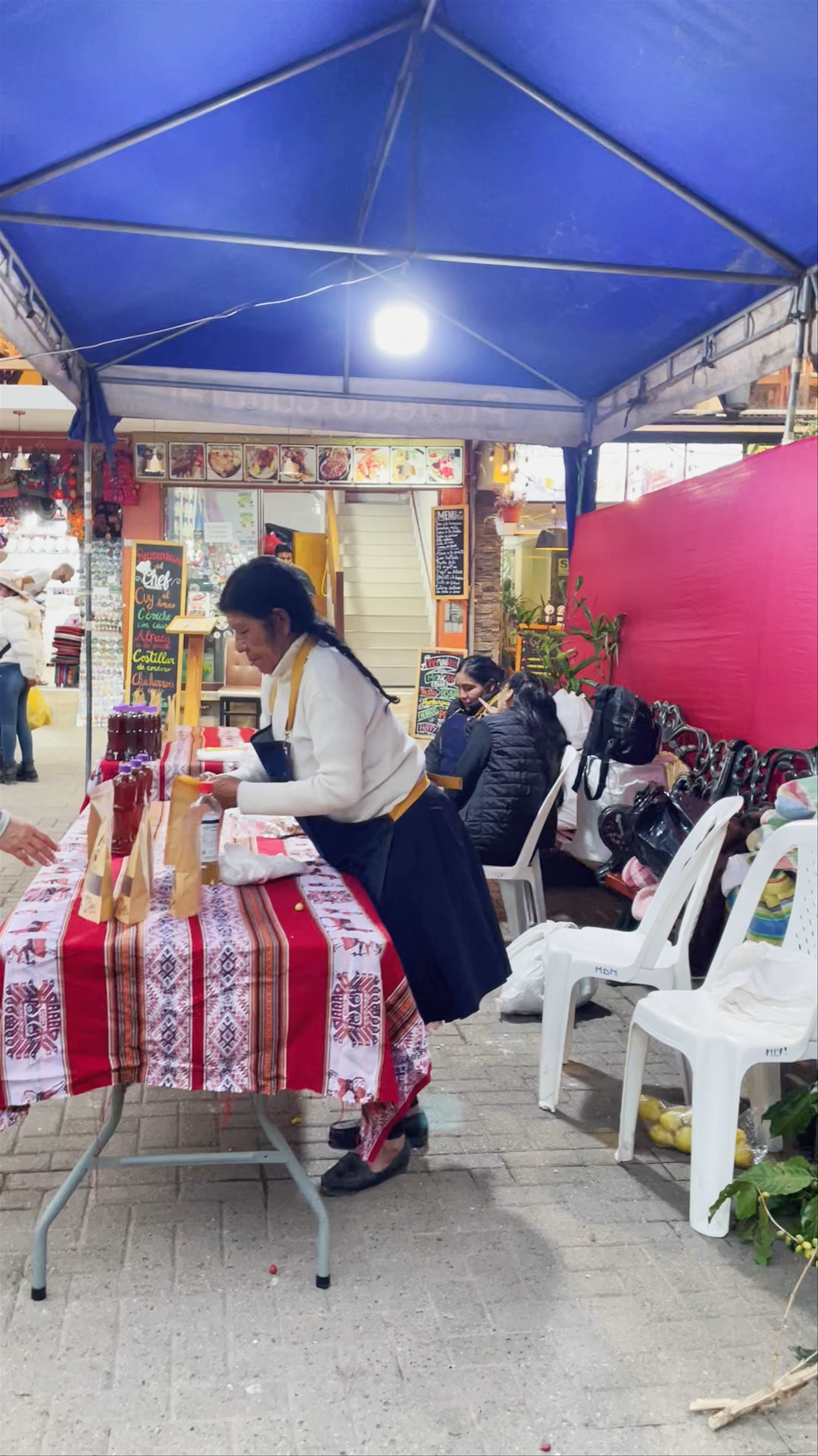 Vibrant Market Scene at Manco Capac Square, Aguas Calientes
