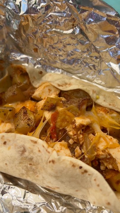 Pagoda Cafe - Adding the sauce - Cafes Near Me - New Orleans, Louisiana
