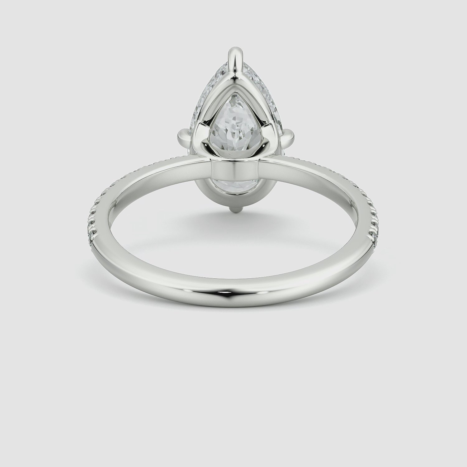 The Compass Solitaire | Pear | 18k | White Gold | bandAccent: Pavé | diamondOrientation: vertical | caratWeight: other