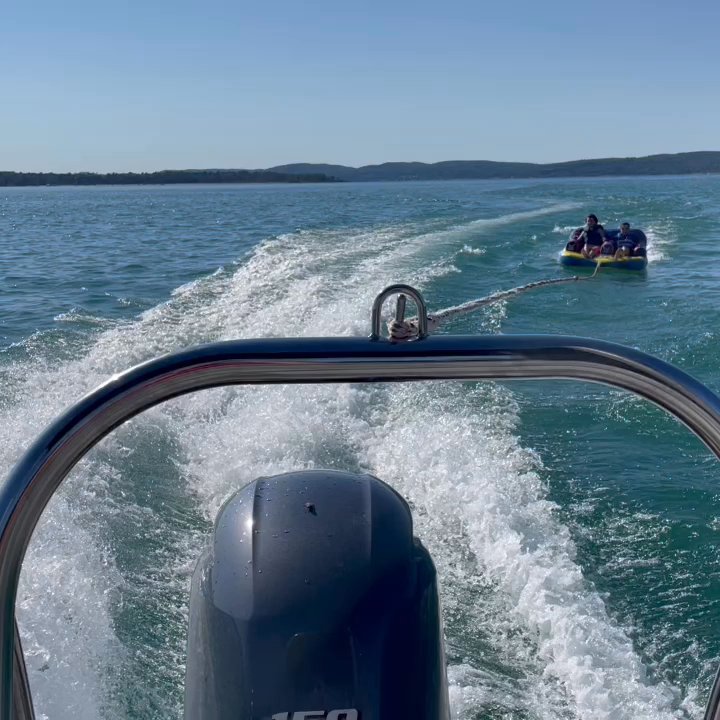 Boyne Watersports - Tubing fun on lake Charlevoix. Kids were a big fan of the 2 person couch like tube - Boating Near Me - Boyne City, Michigan
