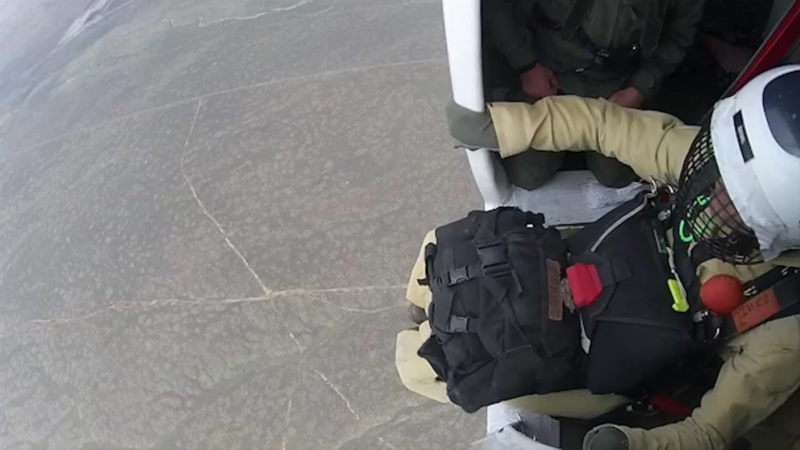 Smokejumpers jumping out of airplane