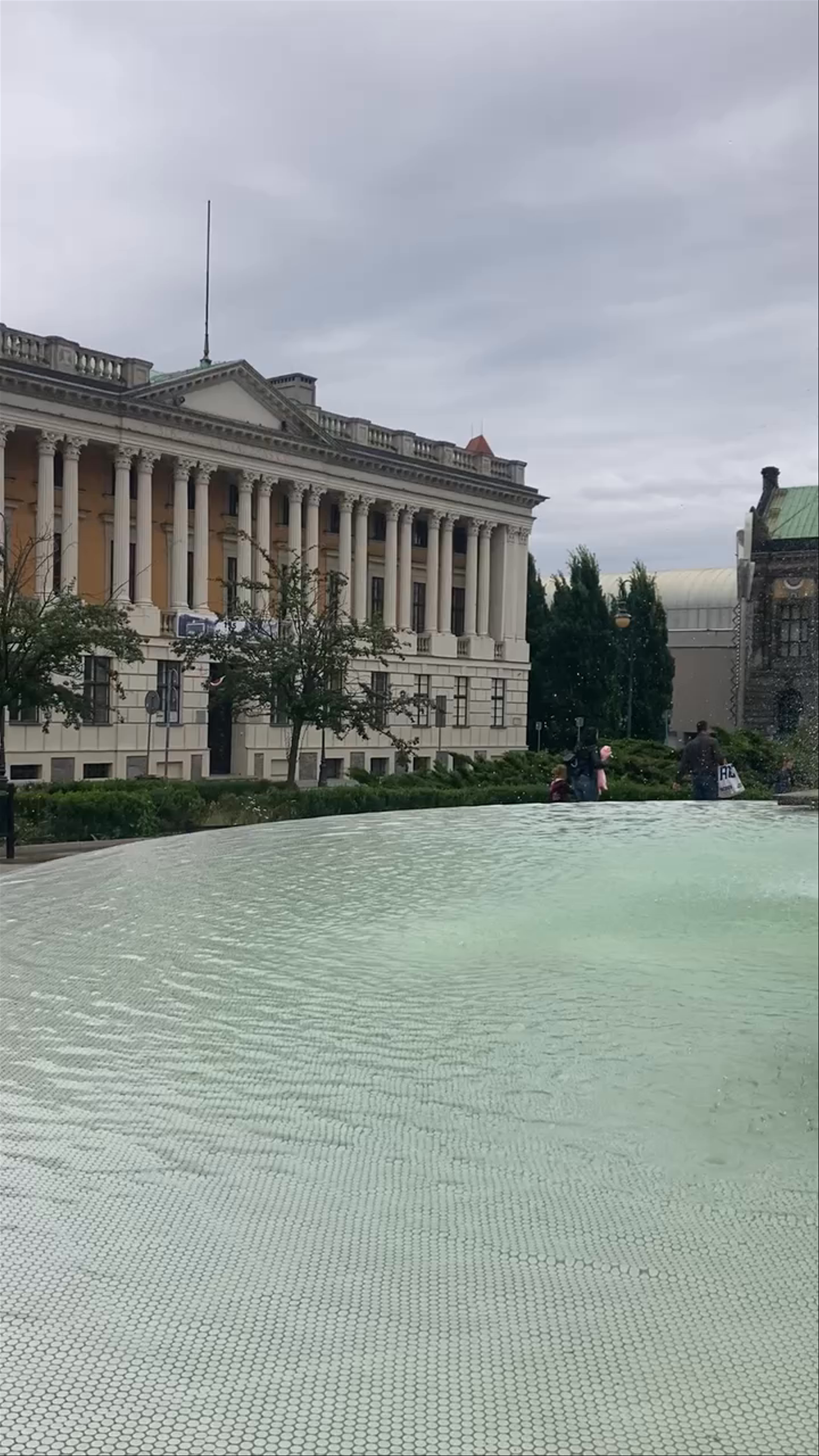 Wolności Square Fountain and Historic Architecture in Poznań
