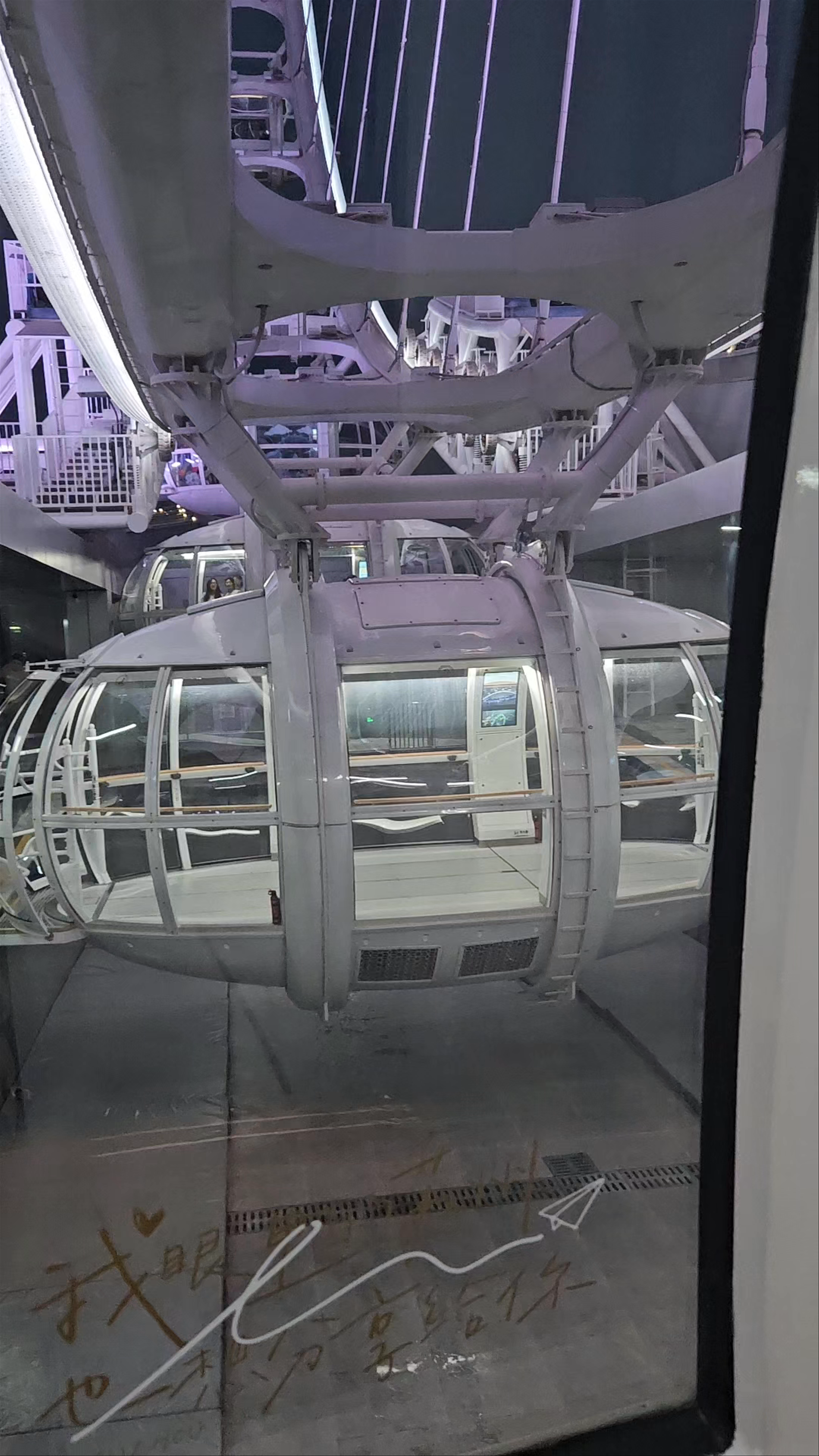 Nighttime Ride on Suzhou Ferris Wheel: Stunning Urban Views from Jiangsu