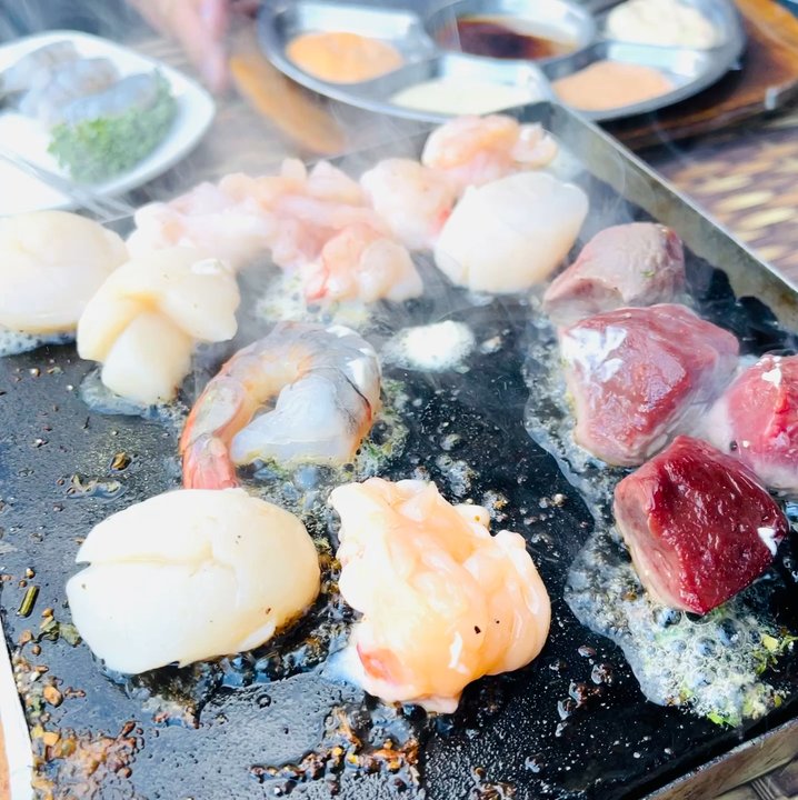 Grizzly House - You grill it up on a hot stone.  FUN! - Fondue Near Me - Banff, Alberta