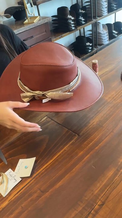 Buckle Bunny Hat Bar - Staff assisting with hat customization - Hats Near Me - Houston, Texas