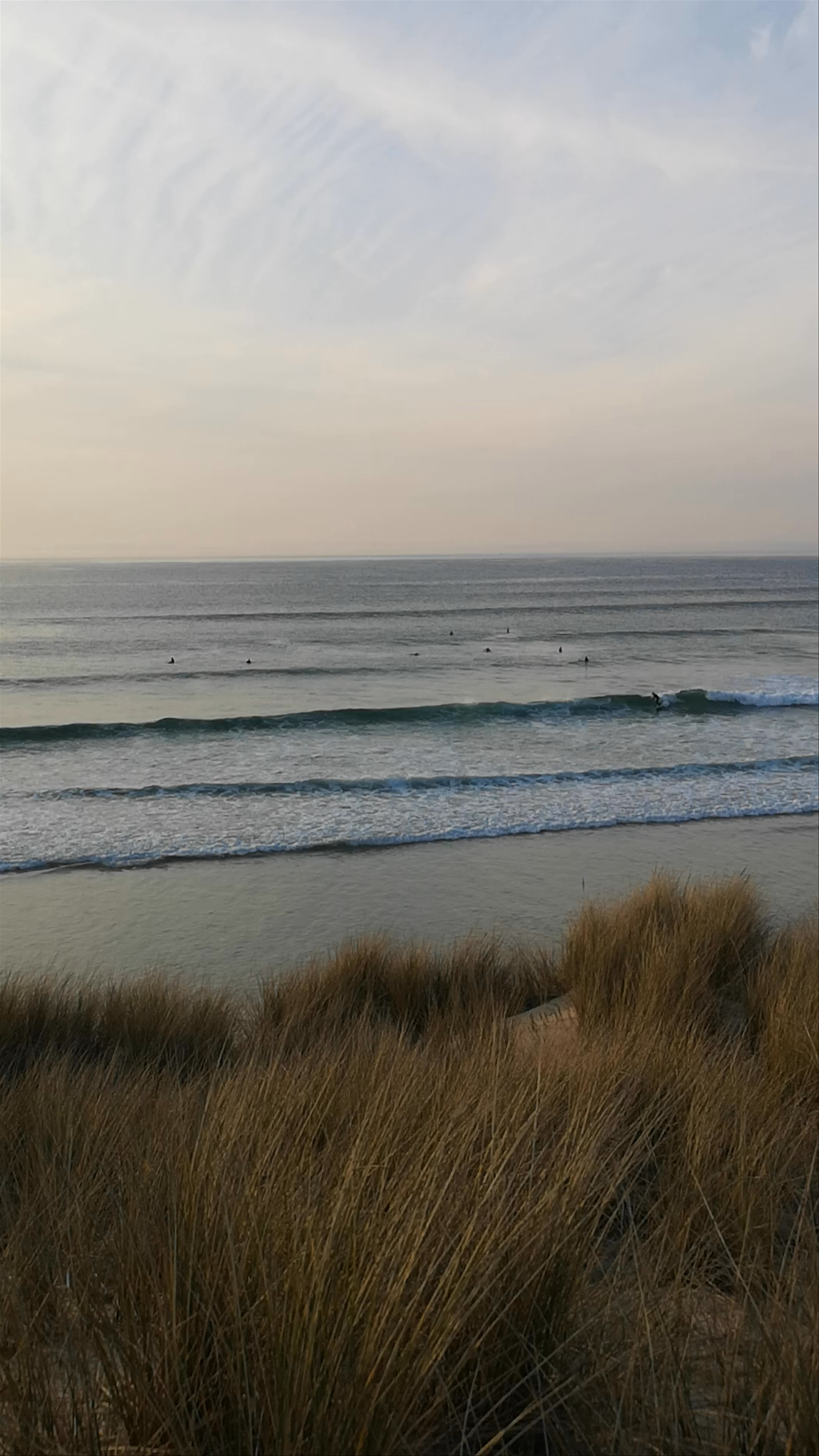 Sandy Acres Beach: Serene Coastal Sunset Waves in Hayle, UK