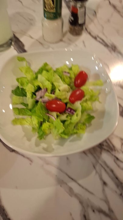 Wiseguys - This is the side salad that you get with your pasta.It was super good.I'm a bit odd.I just don't like dressing - Italian Near Me - Joplin, Missouri