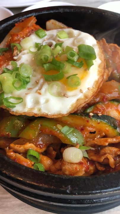 Dae Bak - Jeyuk Dolsot Bibim Bap: Hear the sizzle? Pot is extremely hot, beware! - Korean Near Me - Philadelphia, Pennsylvania
