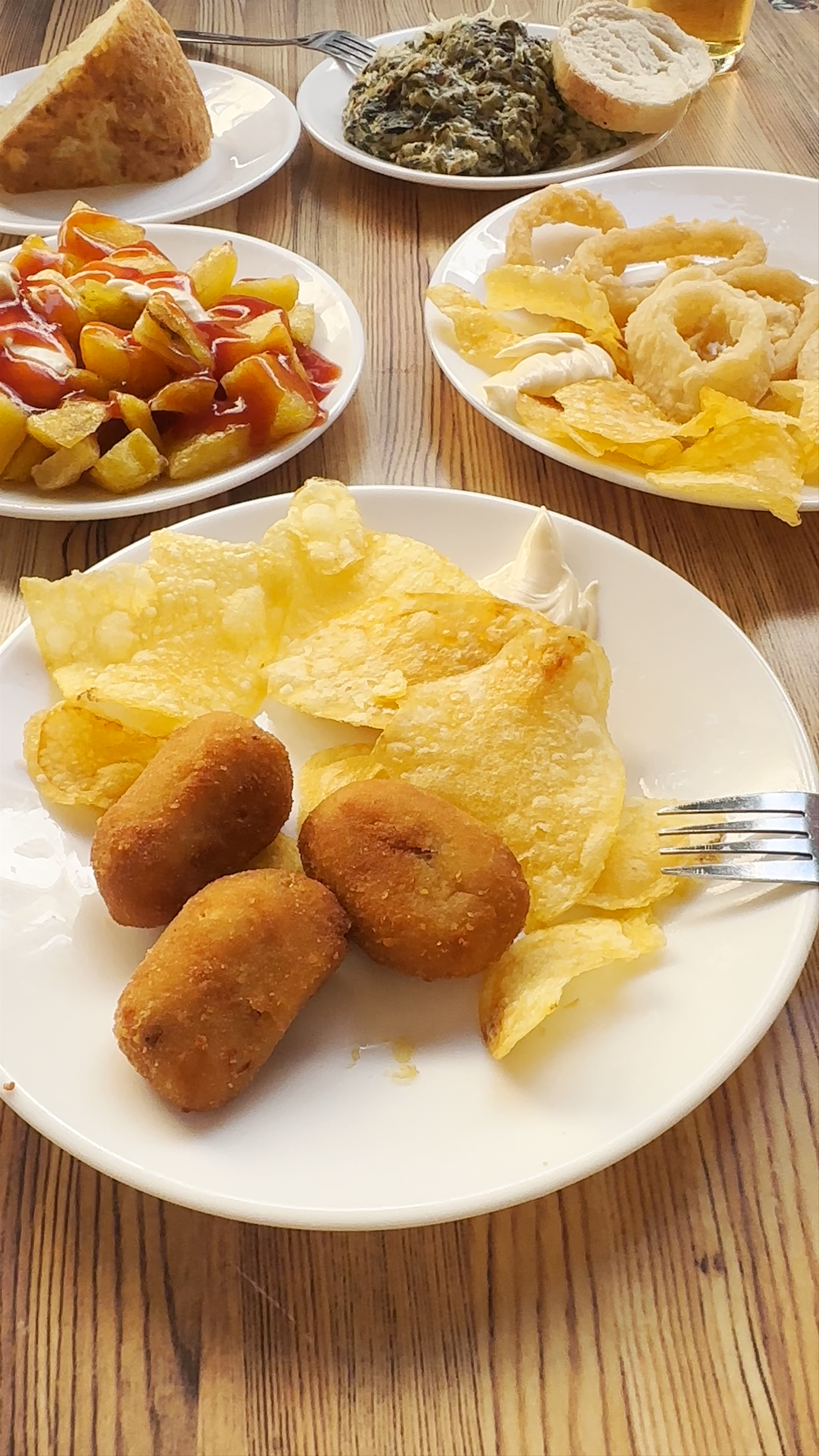 Tapas Delight at Bodega Santa Cruz Las Columnas in Seville, Spain