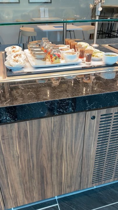 The Centurion Lounge - Food was served by a host - Airport Lounges Near Me - Jamaica, New York