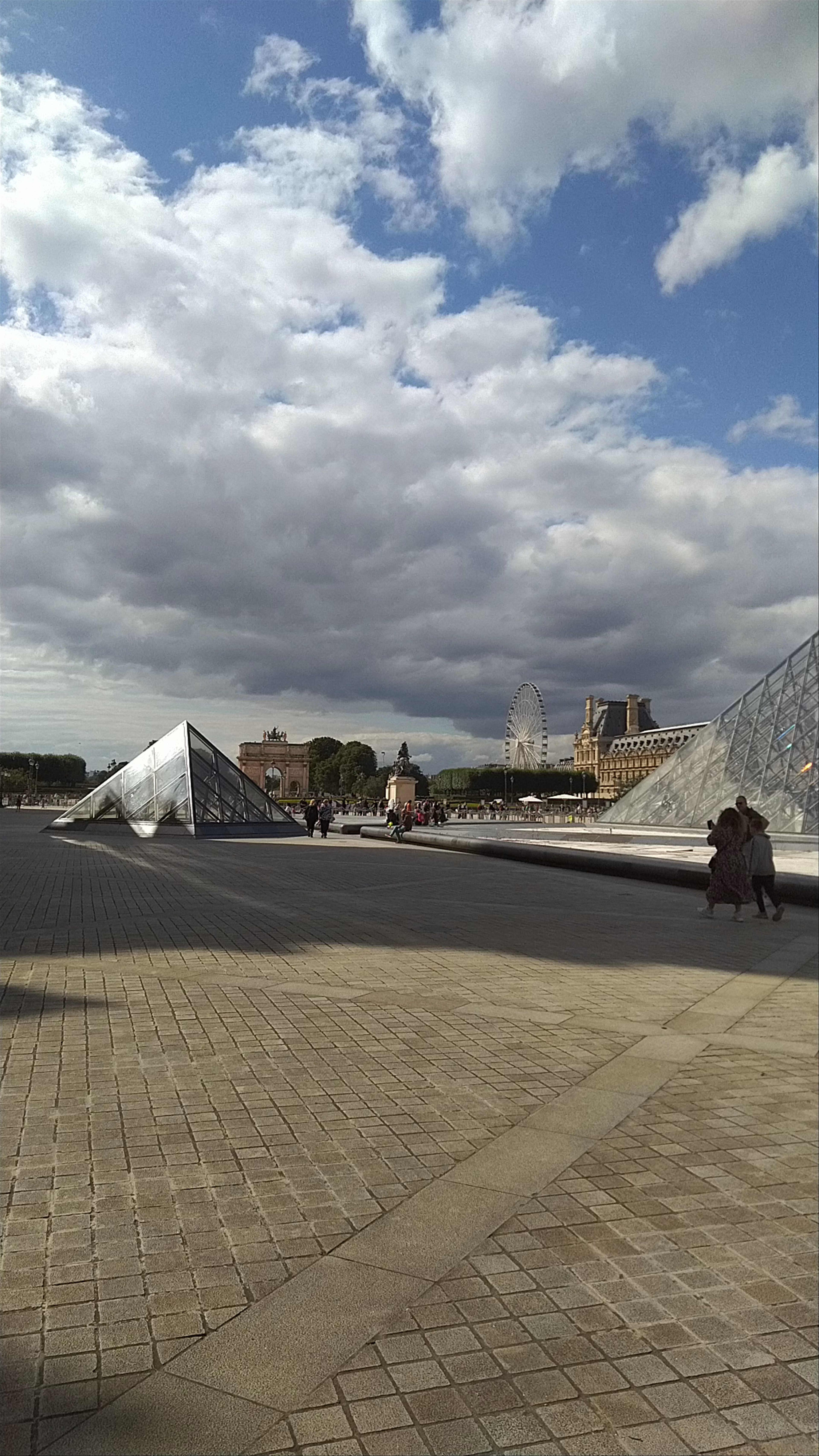 A Serene Visit to the Louvre Pyramid in Paris