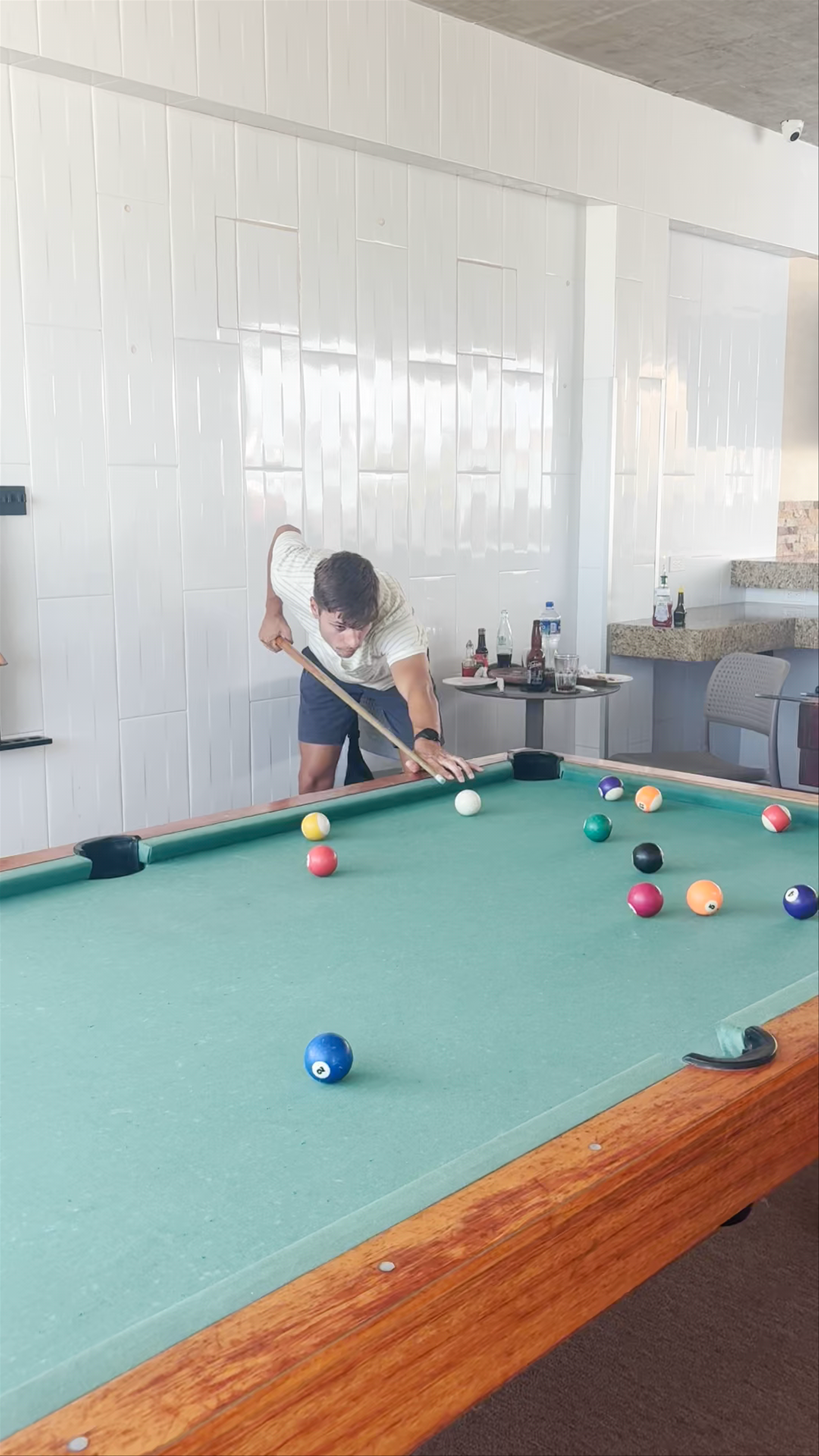 Casual Indoor Fun Playing Pool and Foosball in Tulum