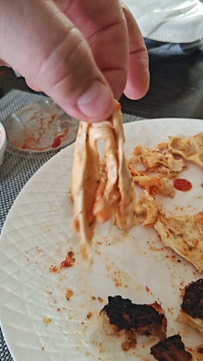 Vitale's - Raw dough inside, burnt outside. No that's not mozzarella. - Pizza Near Me - Grand Rapids, Michigan