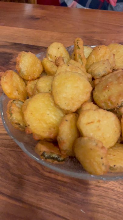 Henry's Restaurant - Short vid of FRIED PICKLE APP - SO GOOD. TONS of fried pickle chips deep fried to golden crispy perfection, piping hot with ranch dressing - American Near Me - Kill Devil Hills, North Carolina
