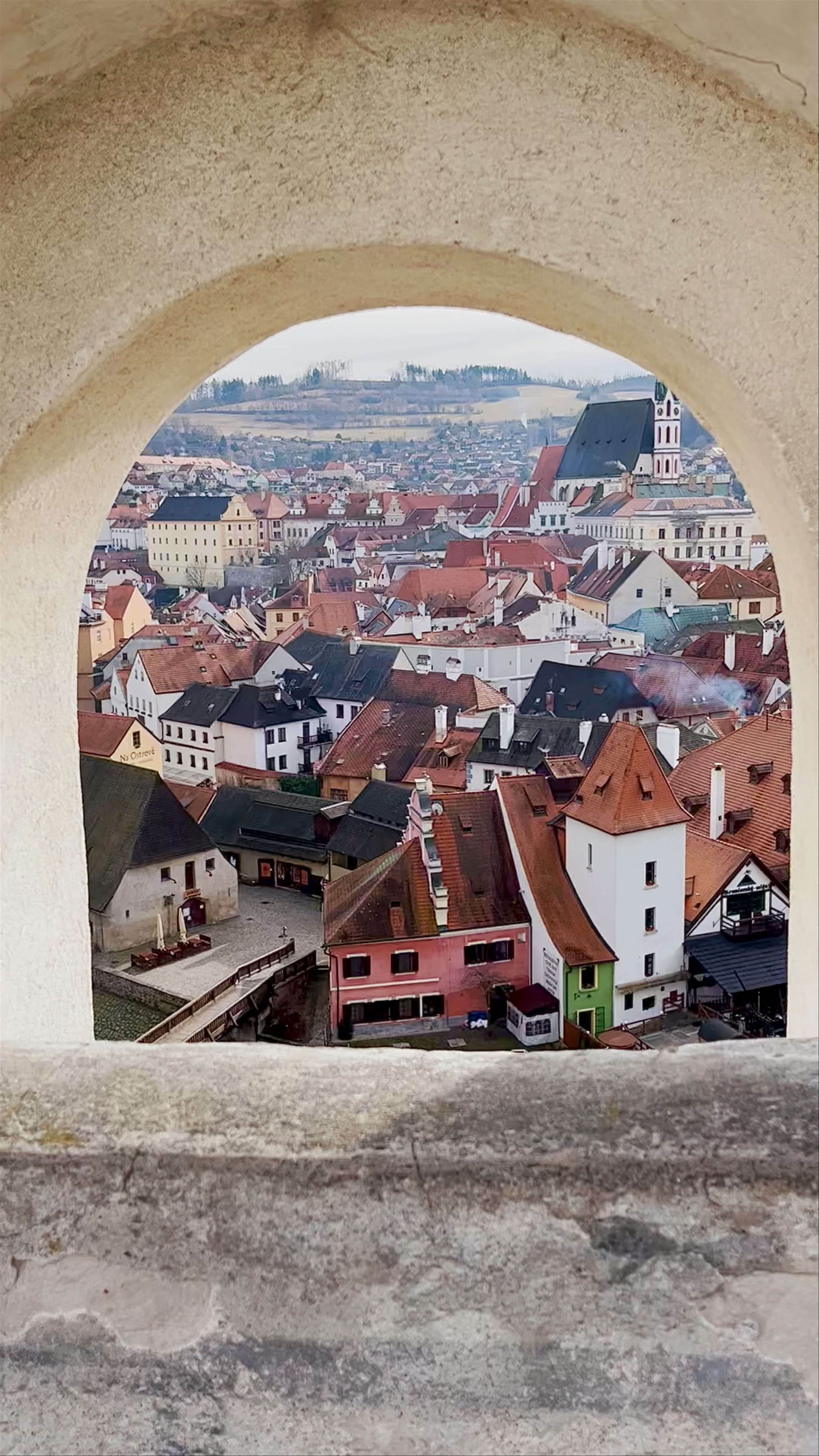 Český Krumlov Castle View: Timeless Beauty Over Red Tiled Rooftops