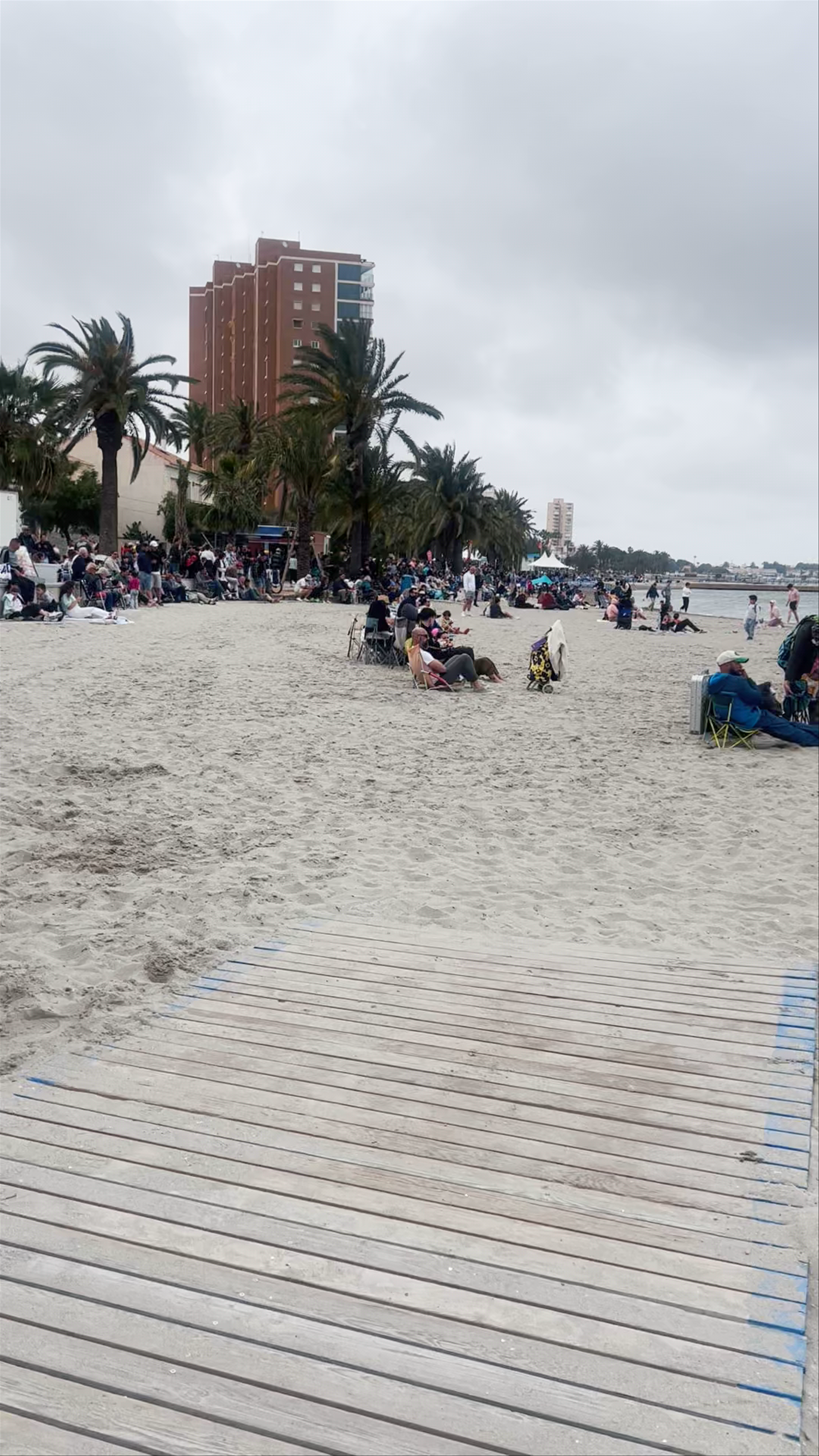 Beach Gathering at Playa del Pescador, Spain