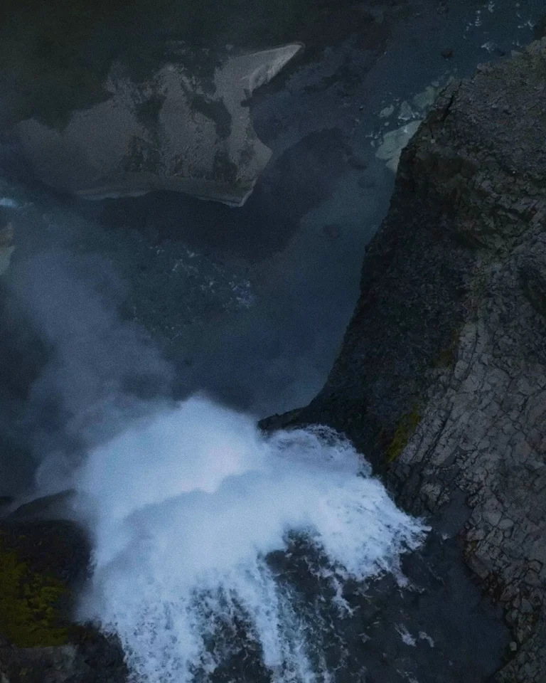 Video montage of man wearing AETHER + Mackintosh Field Anorak in Iceland