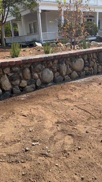 Castillo Stoneworks - Beautiful Rio Rock wall with a used Brick cap - Masonry/Concrete Near Me