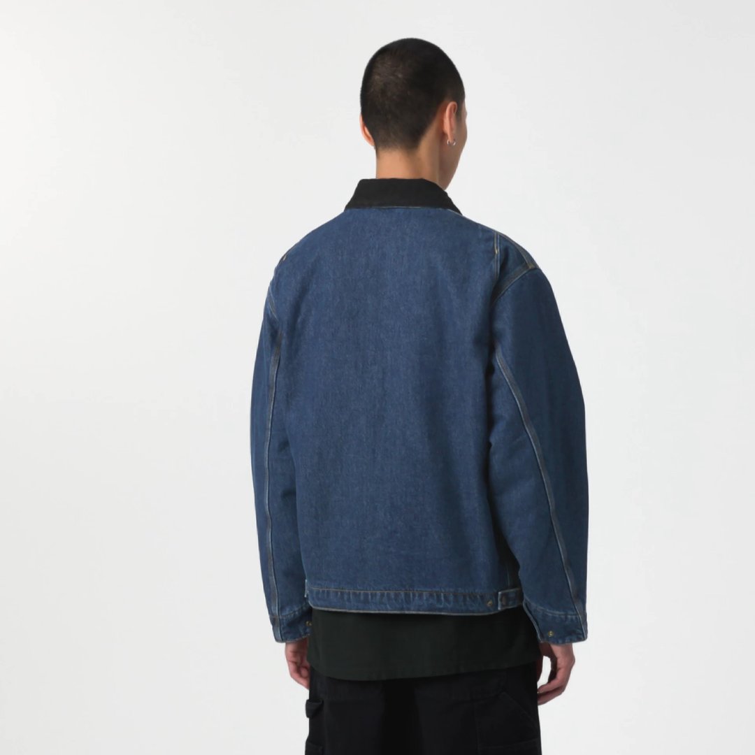 Model wearing an OG Detroit Jacket Winter in Blue Denim