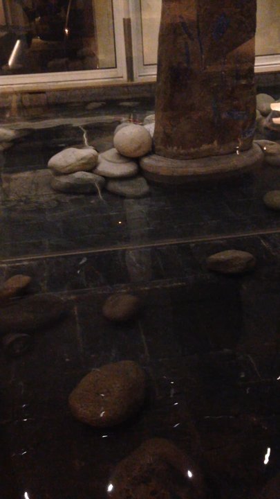 Claris - The pond on the first level. The koi are fake but the pond is still very nice. - Hotels Near Me - Barcelona, B