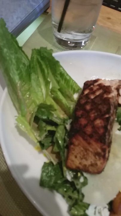 Black's Bar & Kitchen - Ceaser, with grilled salmon - New American Near Me - Bethesda, Maryland
