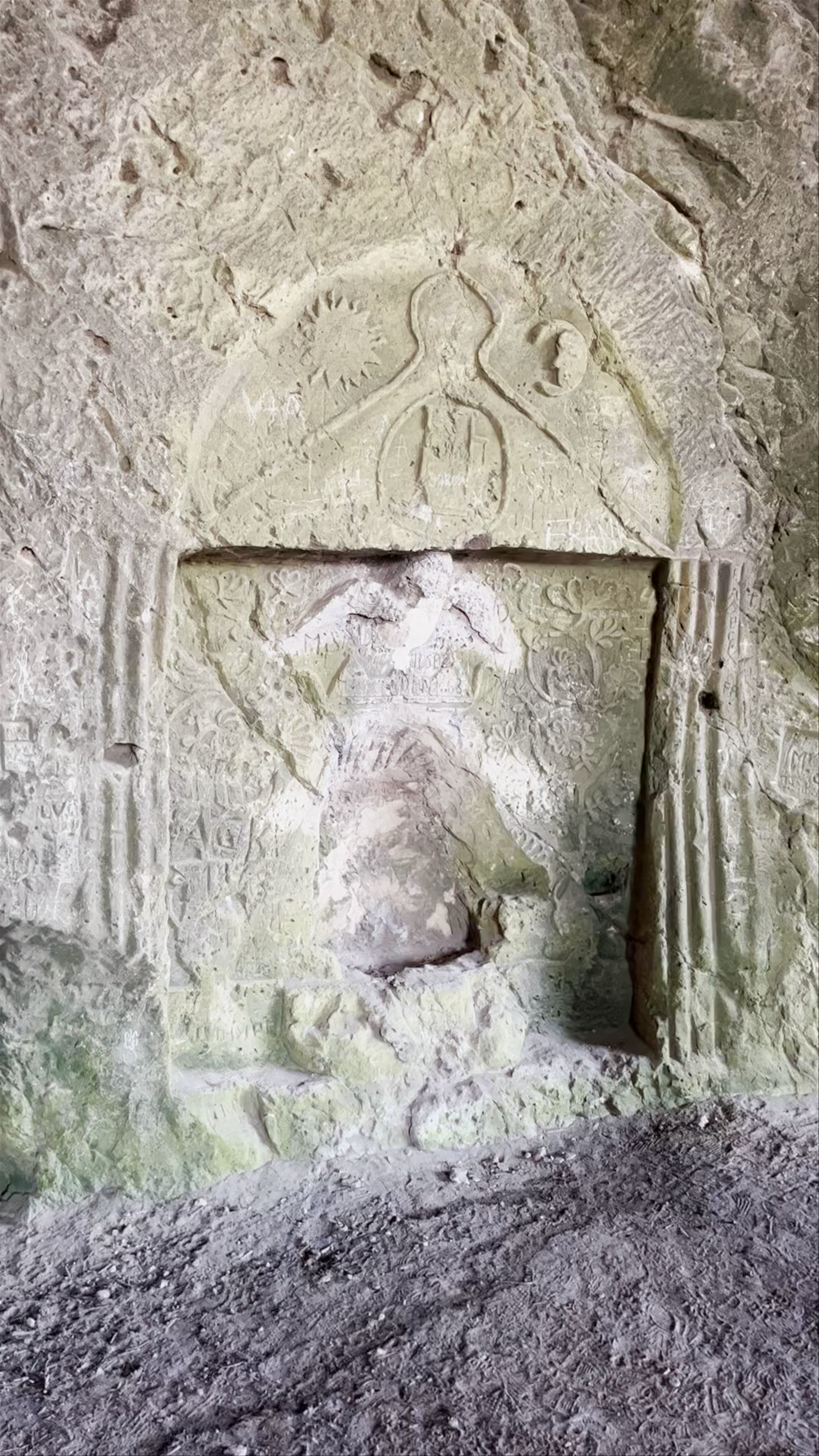 Mystical Rock Carvings Inside Cueva de Portals Vells, Spain