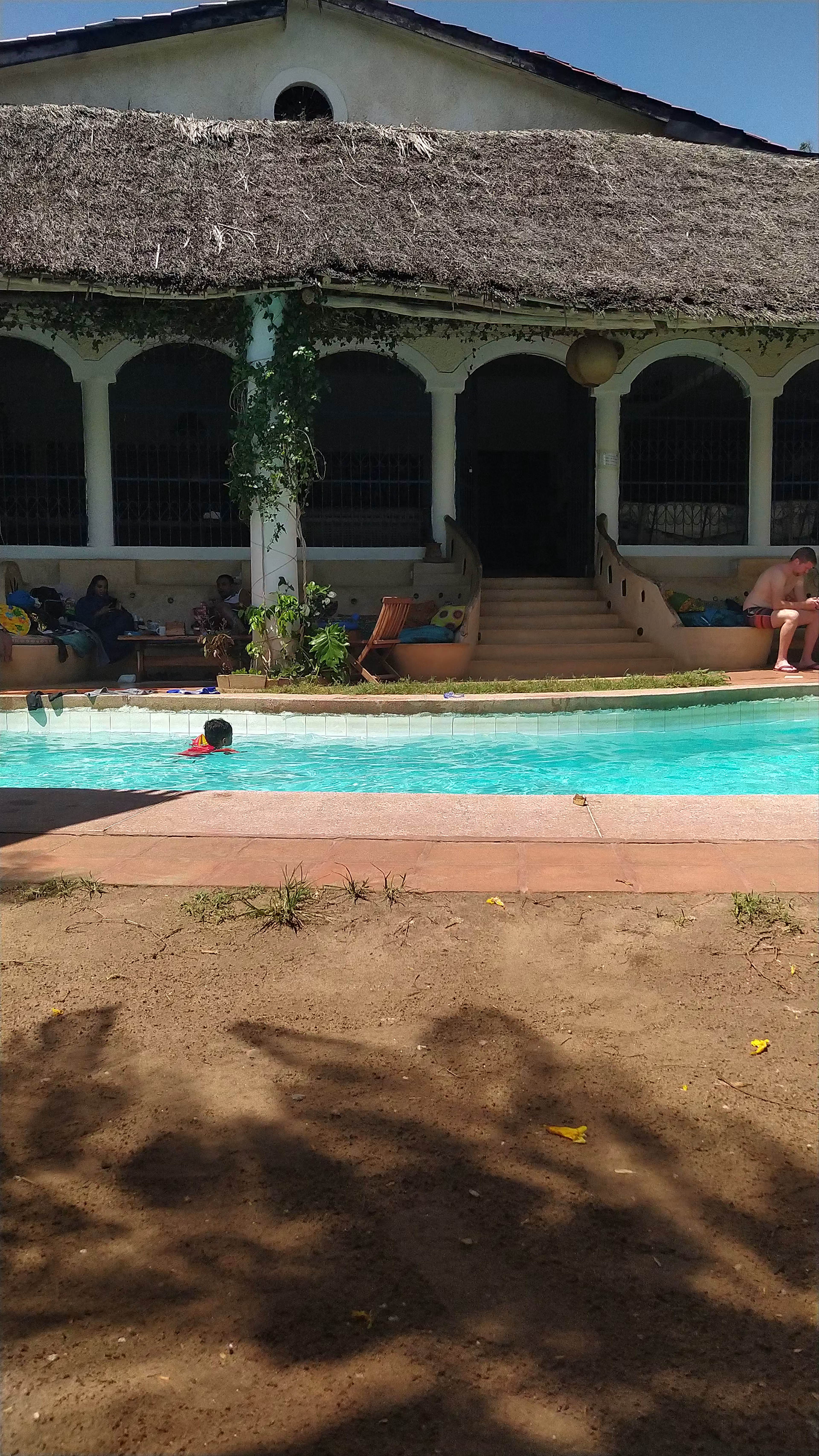 Distant Relatives Ecolodge & Backpackers Poolside Relaxation in Kilifi