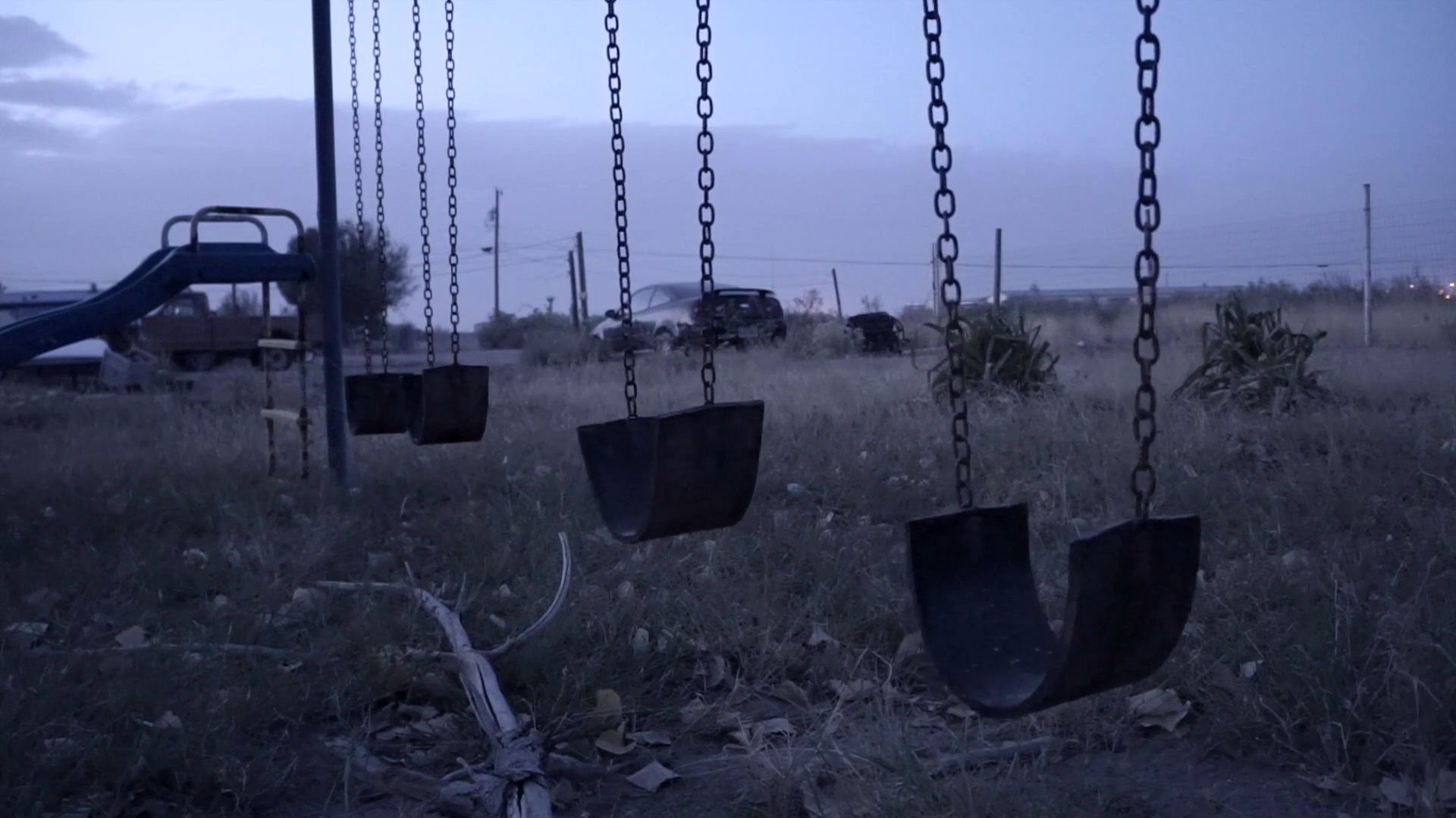 A quiet, rural playground at dusk serves as an introduction to a chronological shift, transitioning to a personal testimony recorded in a podcast studio setting.