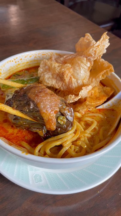 Satay - $10.50 Curry Mee with Stuffed Tofu, Eggplant, Pepper. Tofu sheet crisps. Delicious! Coconut curry broth - Chinese Near Me - Flushing, New York