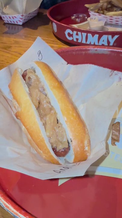 Wursthaus - Andouille sausage with caramelized onions and Belgian fries - Pubs Near Me - Santa Ana, California