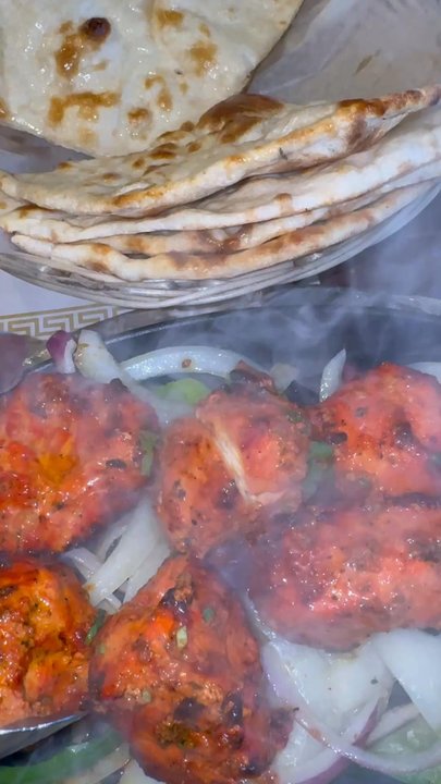 Biryani Pot - Chicken Tikka comes in sizzling platter - Indian Near Me - Houston, Texas