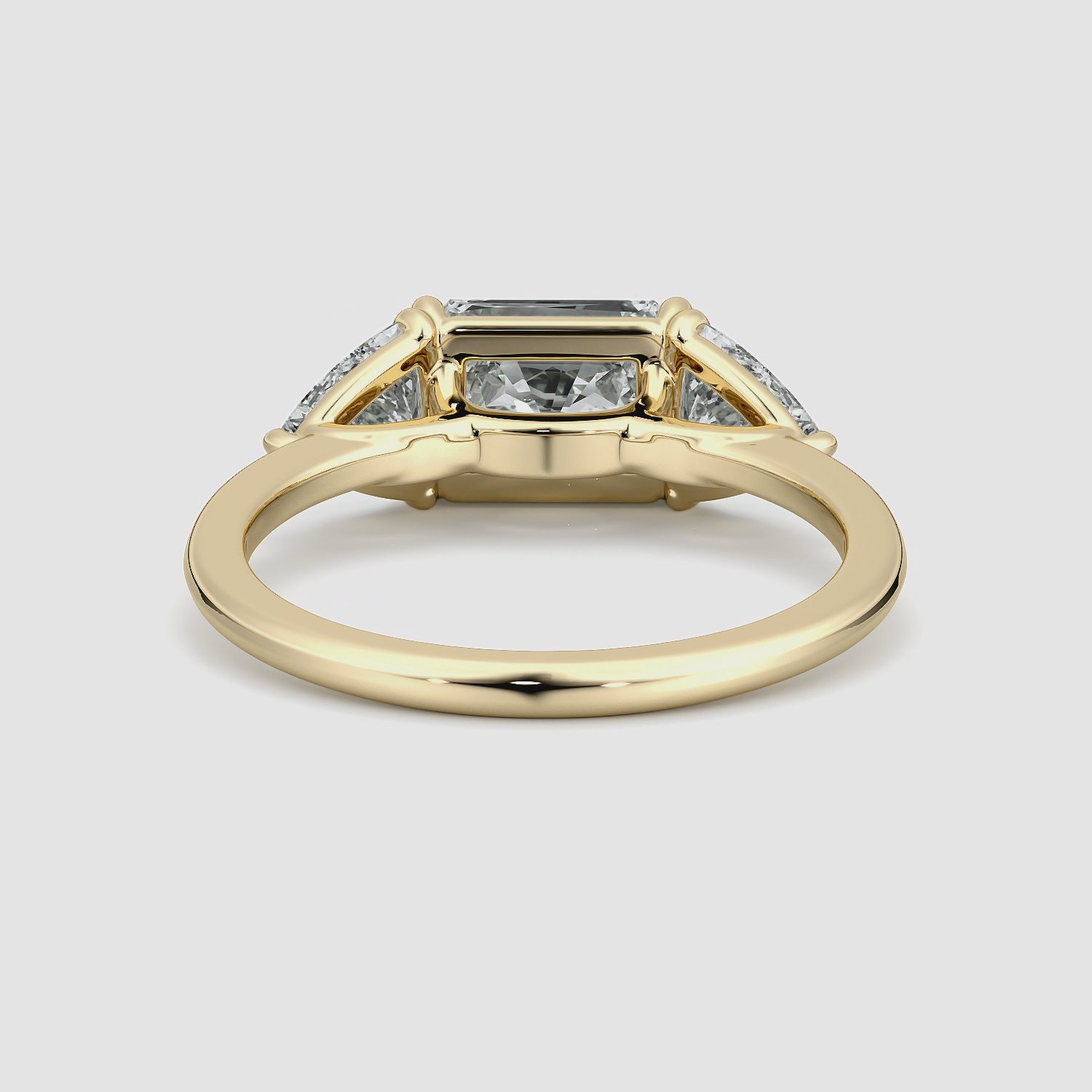 The Three Stone | Radiant | 18k | Yellow Gold | bandAccent: Plain | diamondOrientation: horizontal | sideStoneCarat: 0.50ct | sideStoneShape: Trillion | caratWeight: other