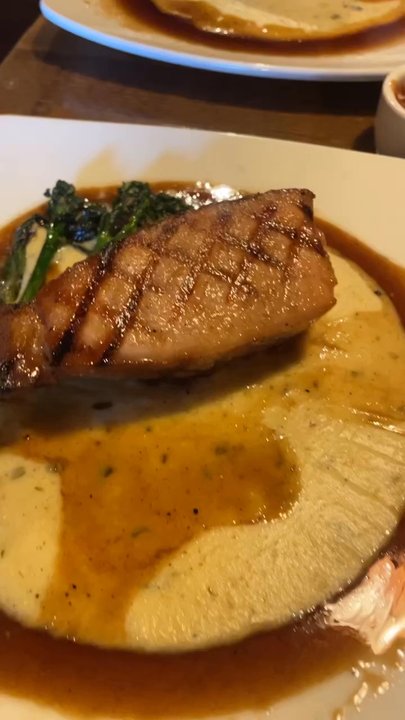 Broken Bit Steakhouse - Whiskey pork chop was a bit on the dry side but flavor was good. The sauce underneath was really good - Steakhouses Near Me - Quartz Hill, California
